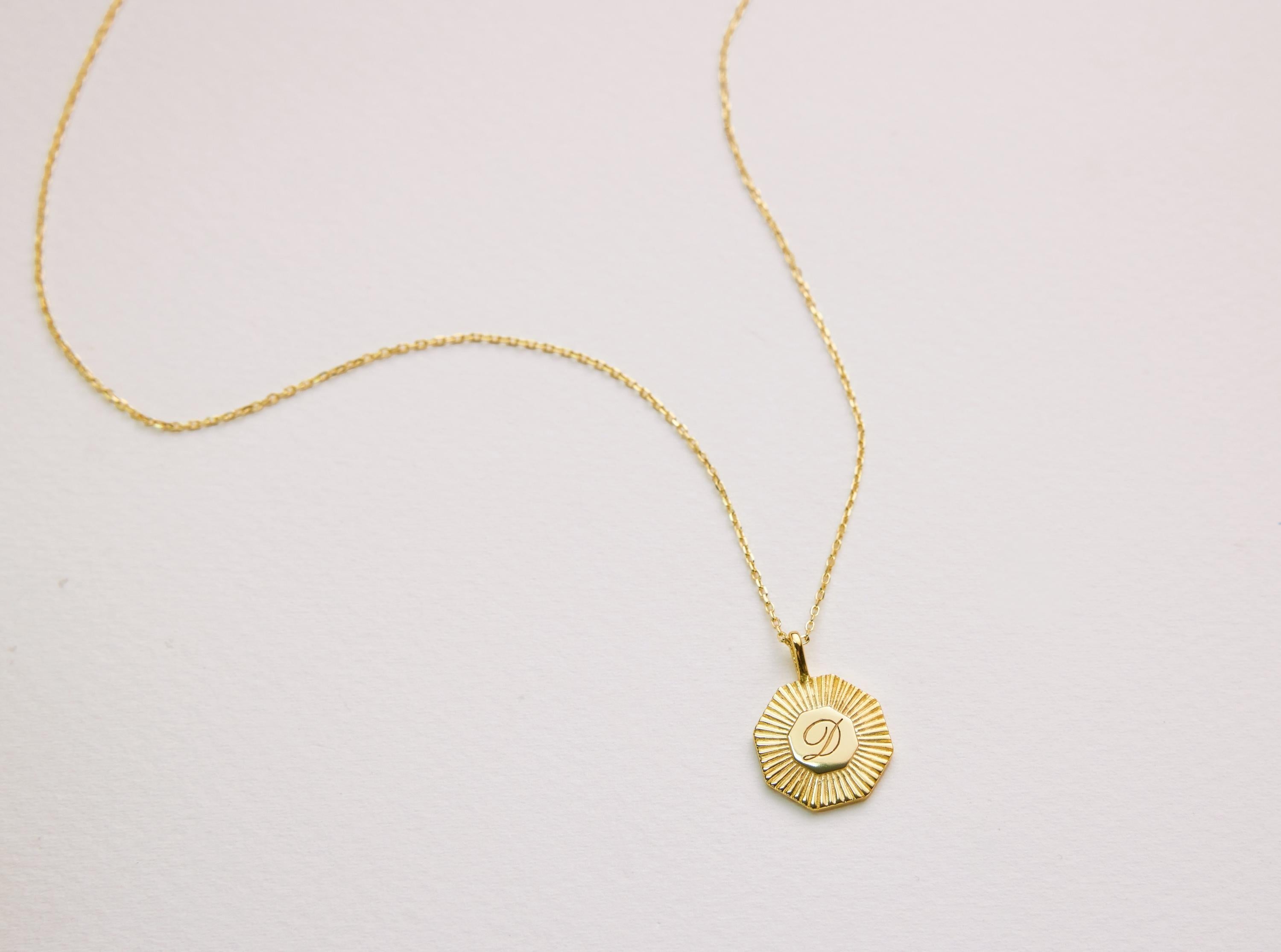 Custom Sunburst Initial Letter Necklace featured in The Timeless Appeal of Initial Letter Necklaces: A Blend of Style and Personalization