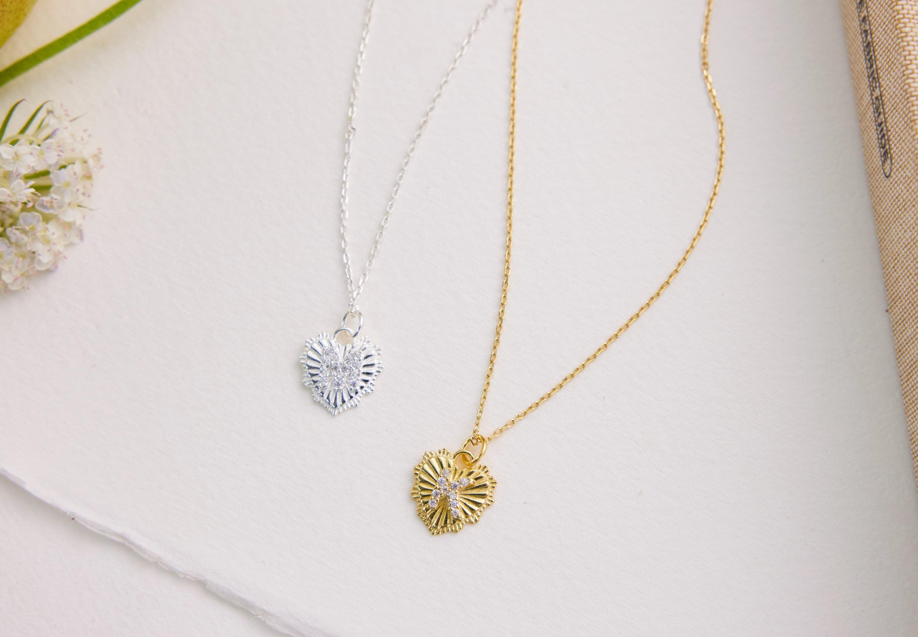 Sunburst Heart Pendant Necklace– Custom Initial With Gold Pavé Charm featured in Carry Your Love Close: The Charm of Initial Necklaces for Every Special Connection