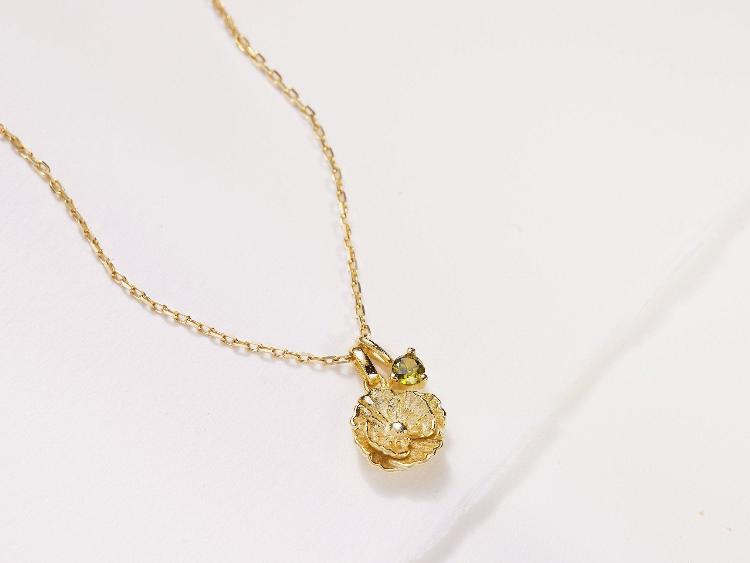 August Poppy Birth Flower Necklace featured in How to Style the Birth Flower Necklace Everyone’s Talking About