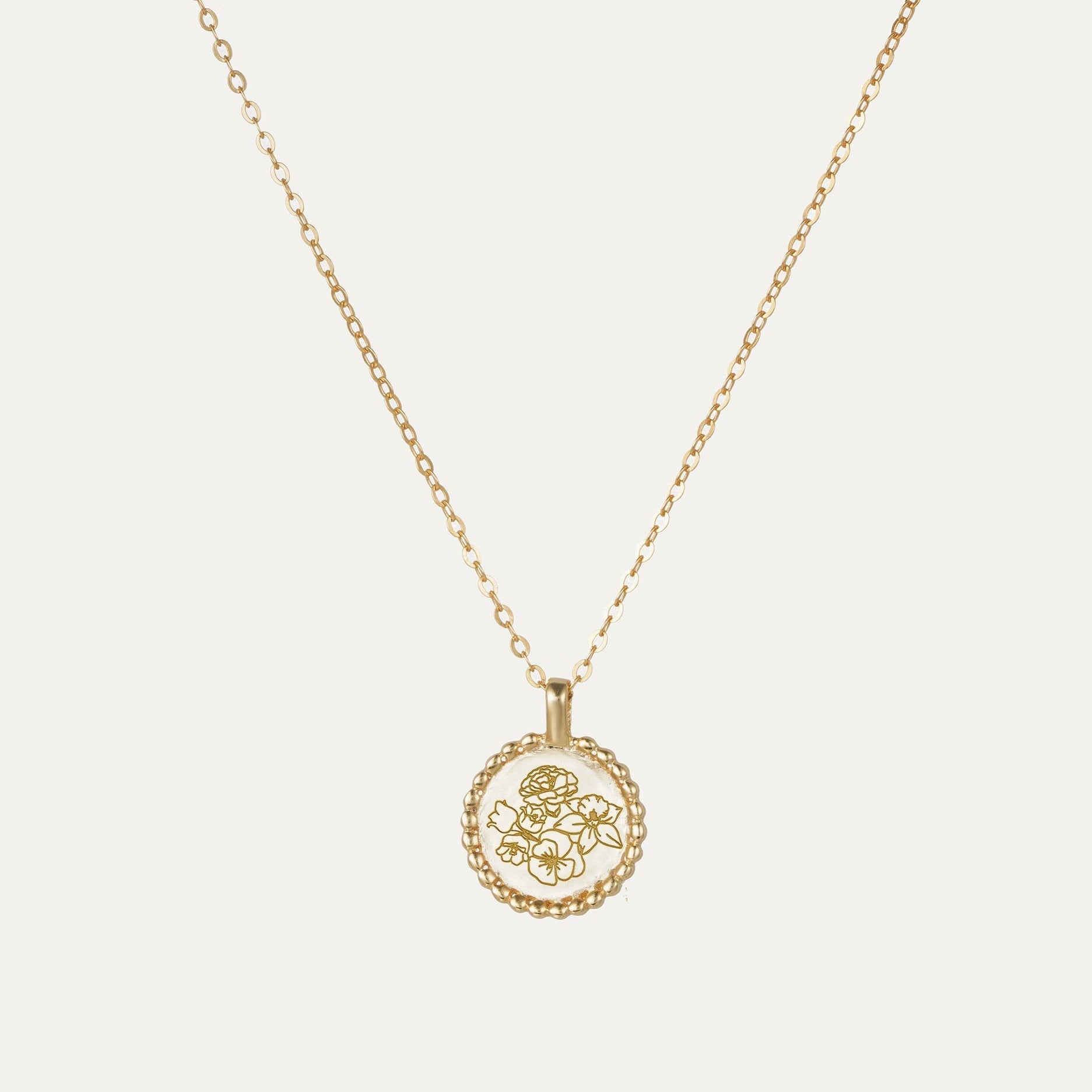 Birth Flower Combined Sun Symbol Necklace featured in The Ultimate Guide to Birth Flower Jewelry: Meaning and Style Tips