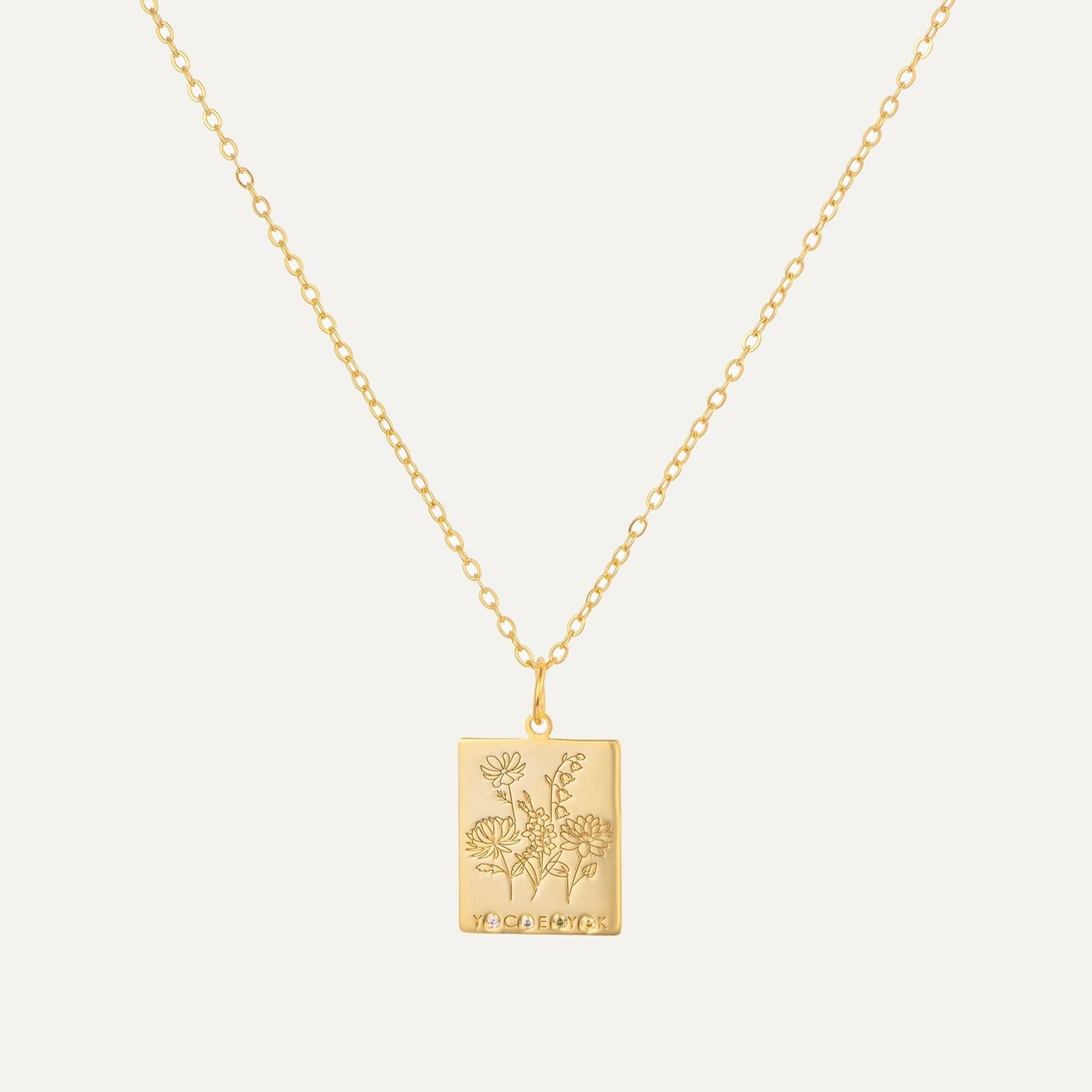 Birth Flower Family Bouquet Birthstone Tag Necklace featured in How to Choose Birth Flower Jewelry to Match Your Style and Personality