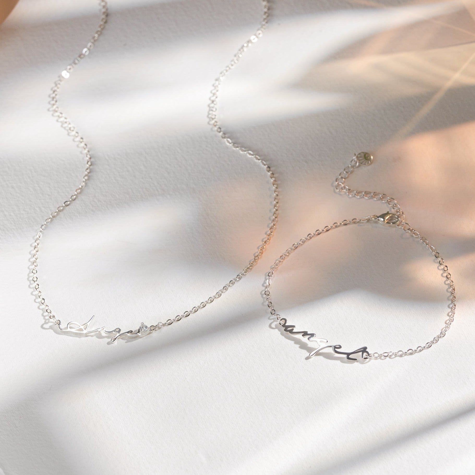 Custom Name Necklace with Birthstone featured in Best Custom Jewelry Gifts for Birthdays by Age