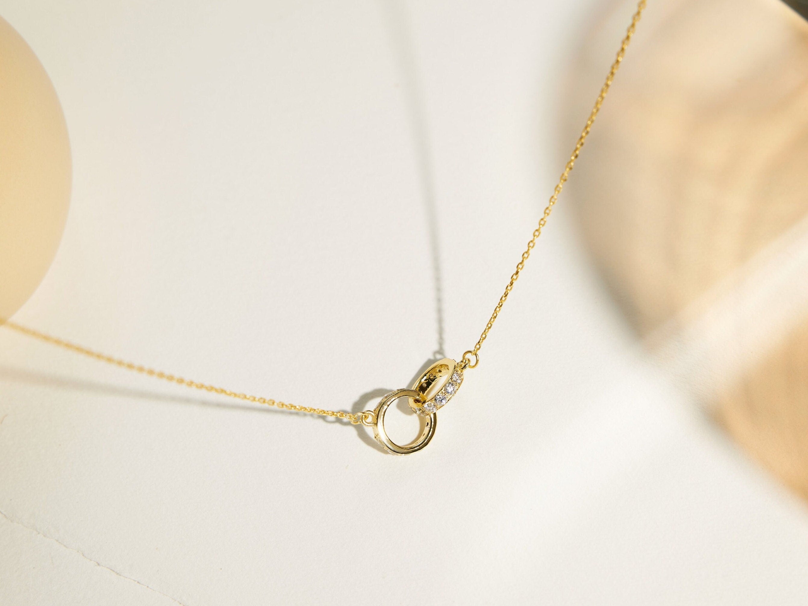 Infinity Interlocking Necklace featured in Custom Couple Necklace Ideas for Long Distance