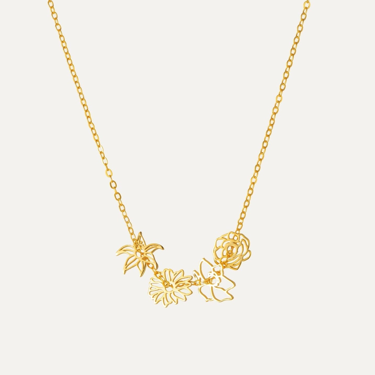 Multi Birth Flower Charm Necklace featured in Discover the Charm of Birth Flower Jewelry: A Personalized Fashion Statement