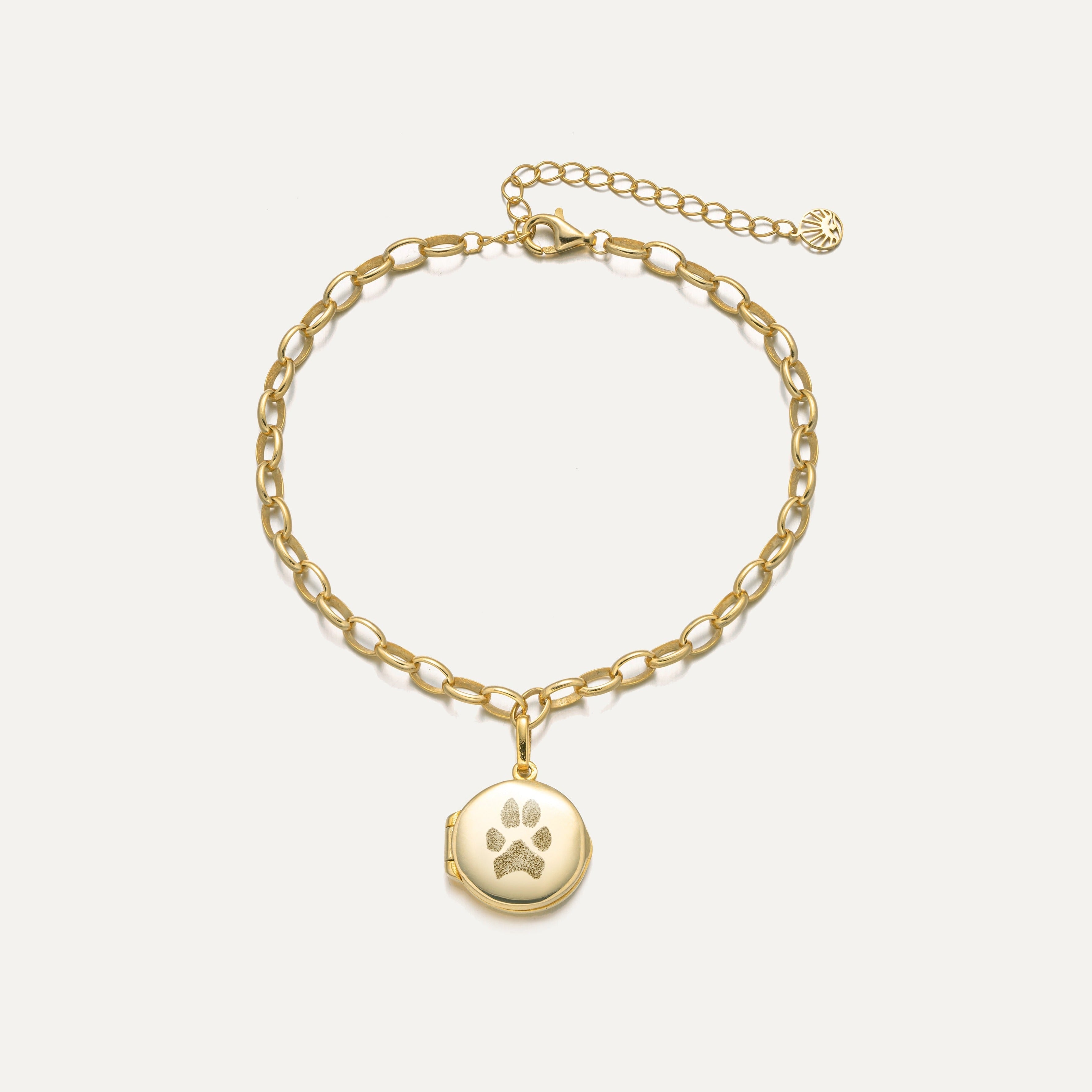 Paw Print Locket Bracelet featured in From Collars to Charms: Transforming Your Pet’s Accessories into Keepsake Jewelry