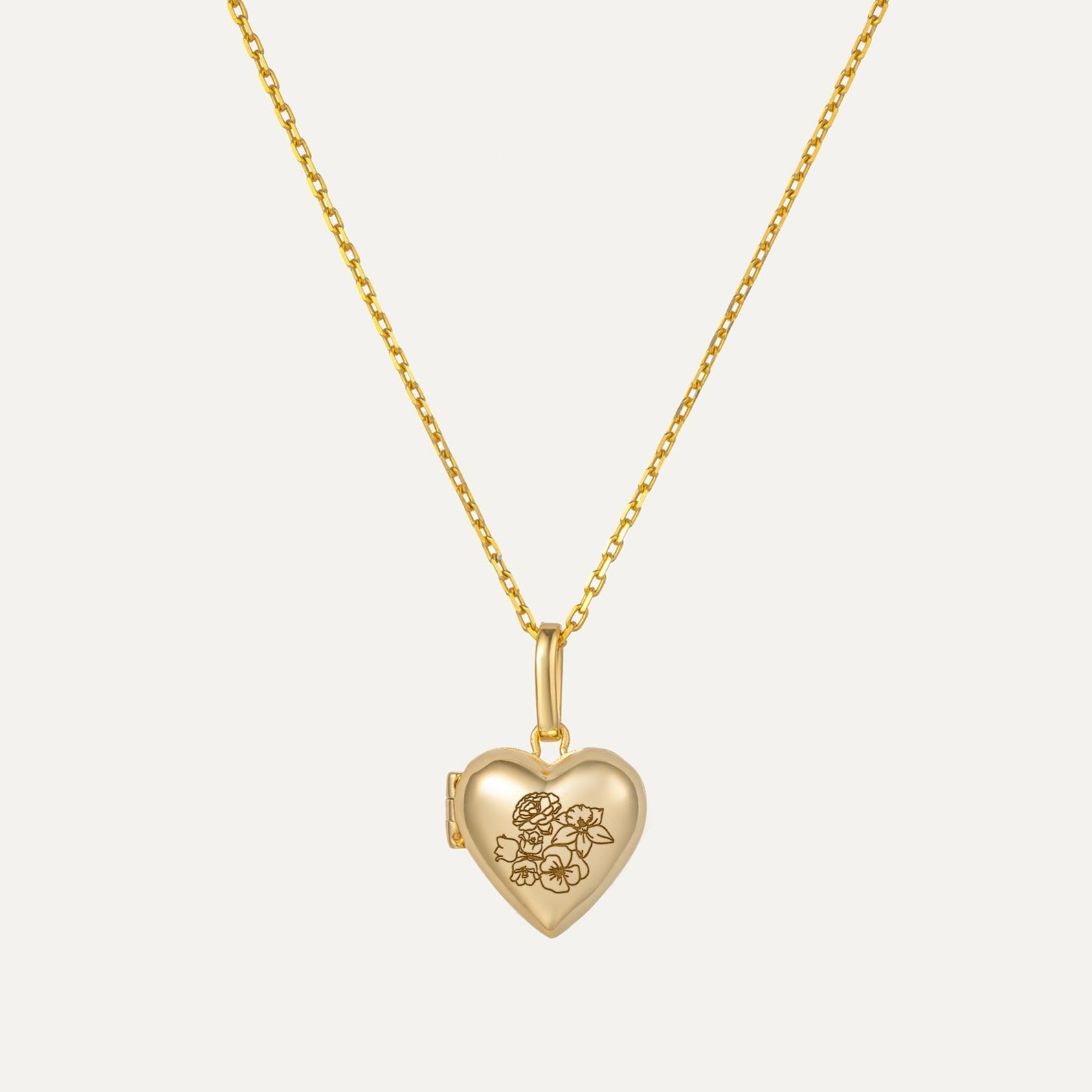 Personalized Birth Flower Heart Locket Necklace featured in A Gift That Speaks from the Heart: The Charm of Birth Flower Necklaces