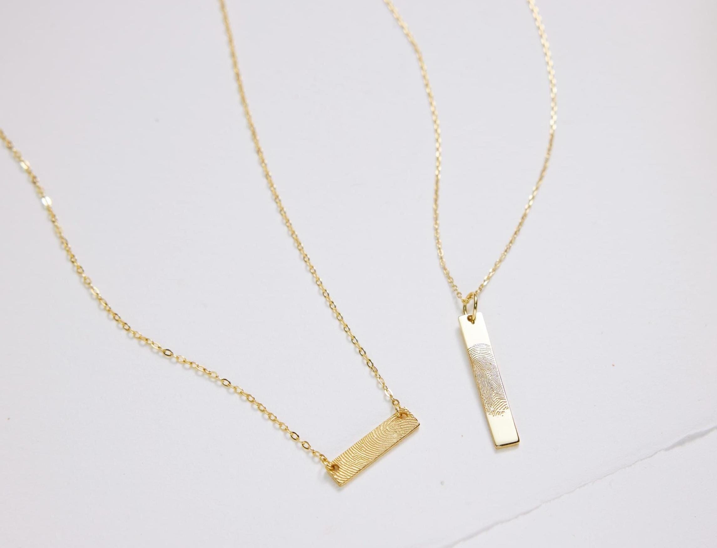 EcoPhilia personalized fingerprint necklace used as a memorial keepsake