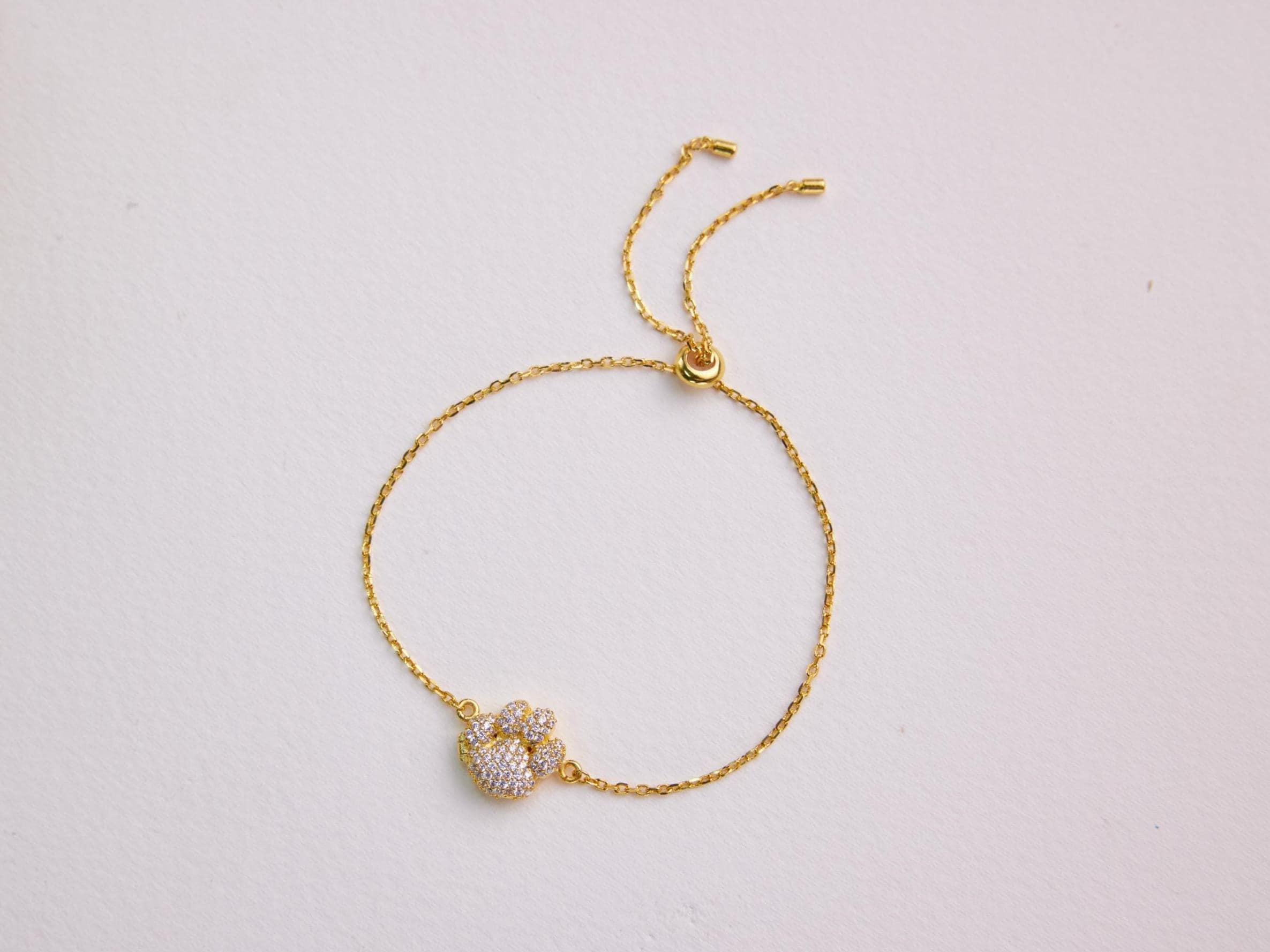 Pavé Paw Bracelet - Pet Paw Charm Bracelet featured in DIY Jewelry Projects Inspired by Pets: Unleash Your Creativity!