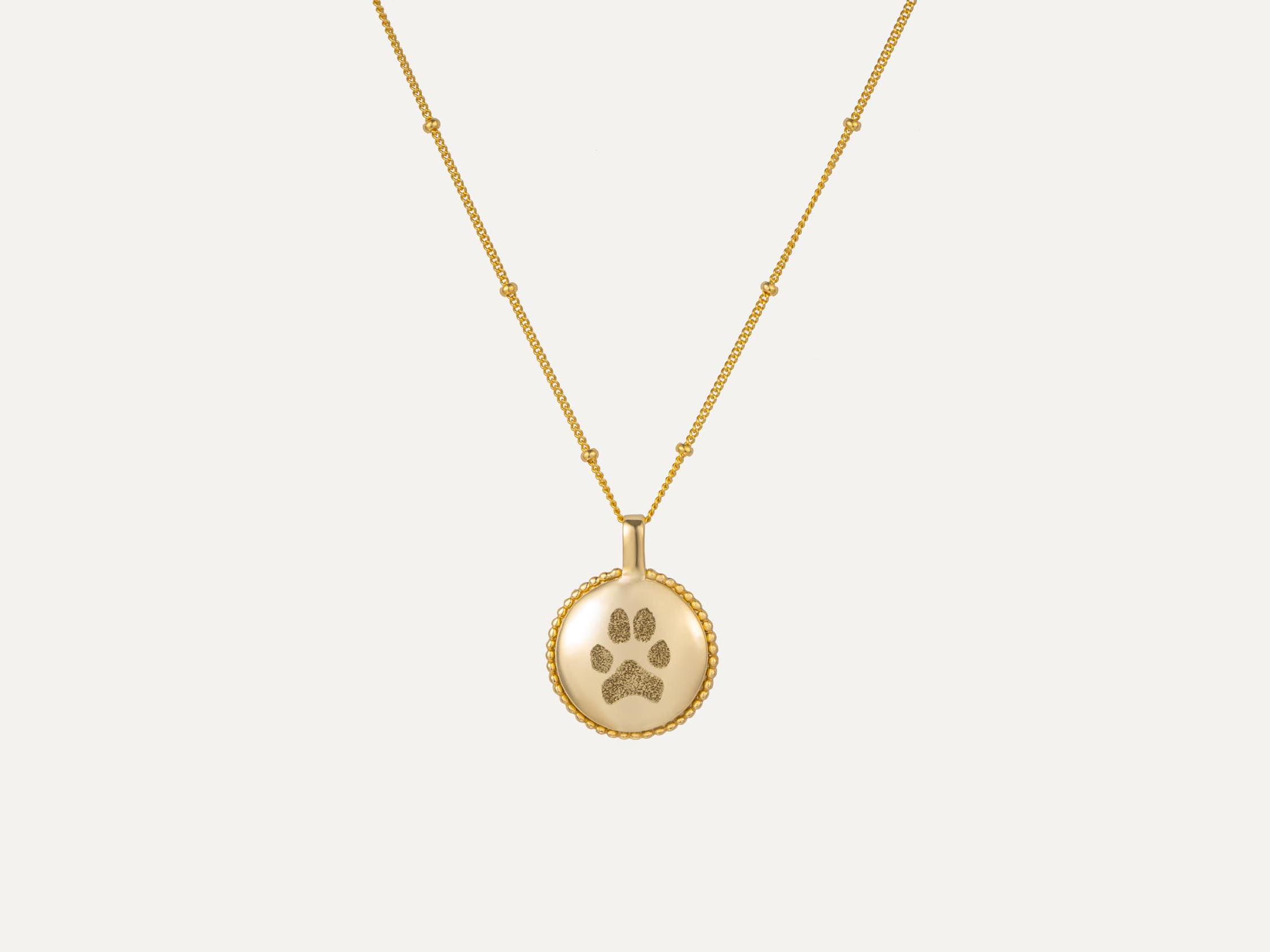 Paw Print Locket Necklace - Custom Pet Necklace Sterling Silver Memorial Gift featured in Memorial Jewelry with Personal Touches: A Beautiful Way to Remember Your Pet