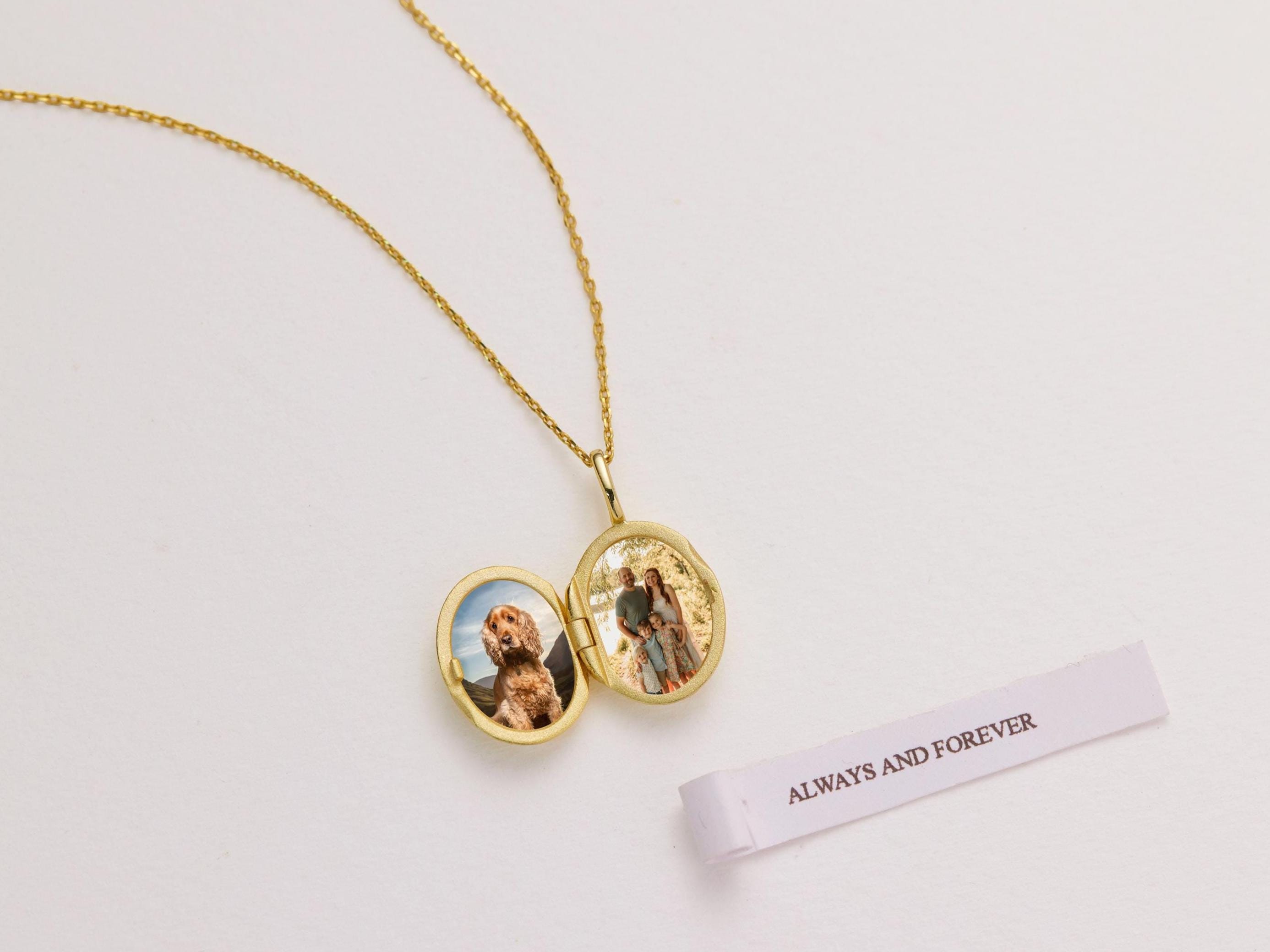 Gold necklace with a locket featuring two photos and a 'Always and Forever' card on a light background